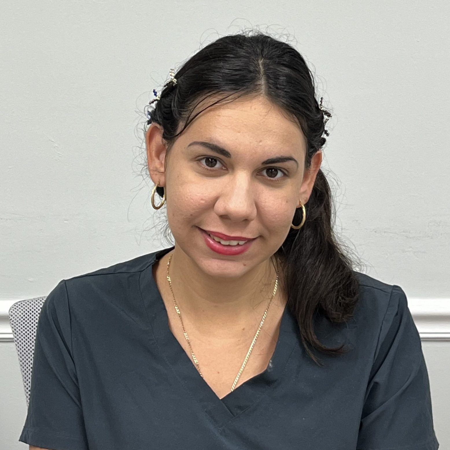 A Woman in a Medical Scrub in Black Color